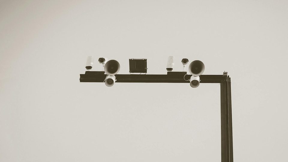 Antenna and monitoring equipment scene representing radar frequency band planning.